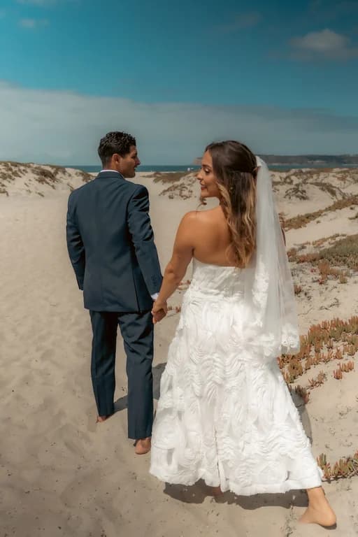 Niko + Kiara walking in the dunes