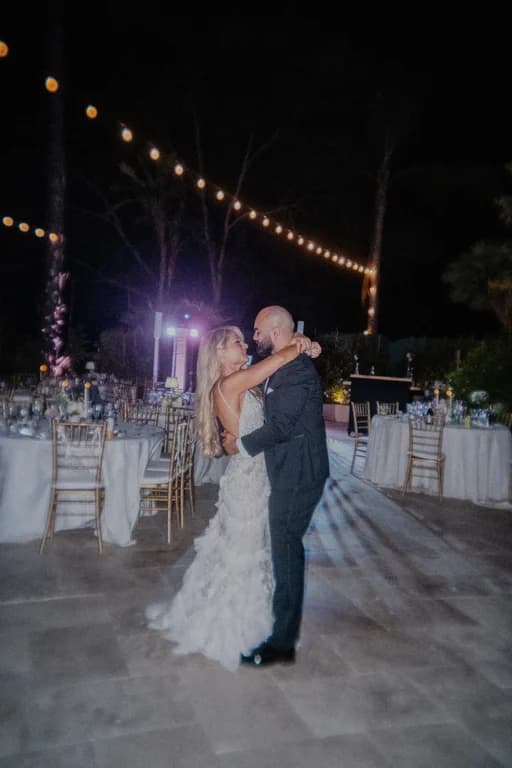 Jovin + Jordyn dancing among the reception tables