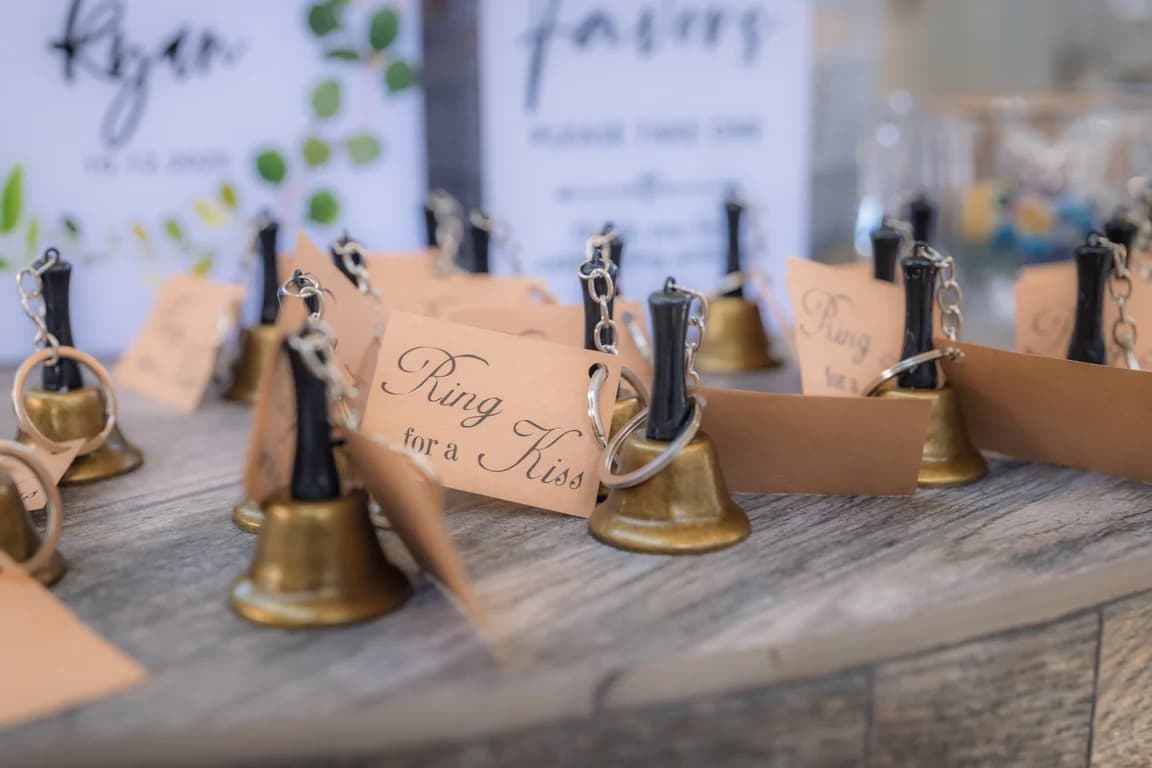 Bells with a 'Ring for a Kiss' sign