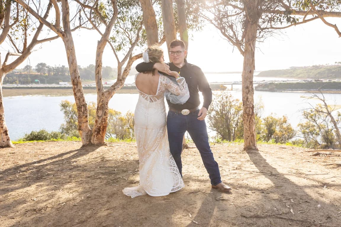 Corbin dipping Michaela among the eucalyptus