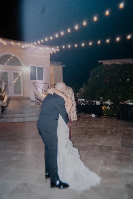 Jovin + Jordyn dancing in front of the house