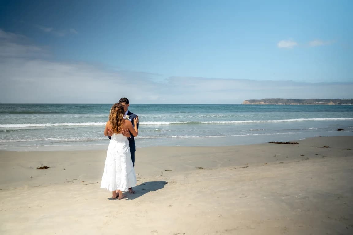 Niko + Kiara far down the beach