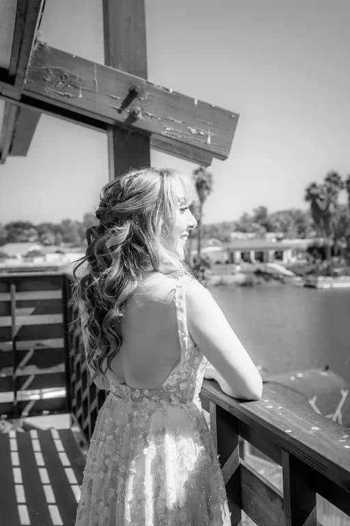 Katy looking out over the water from the balcony