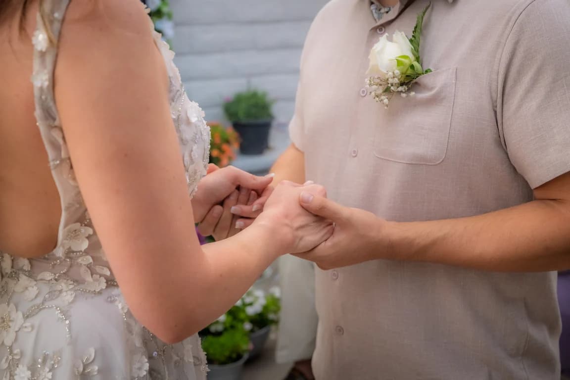 Katy + Ryan holding hands
