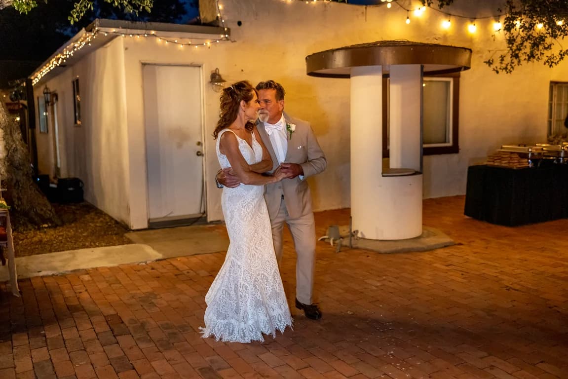 Randy + Joy dancing on the patio