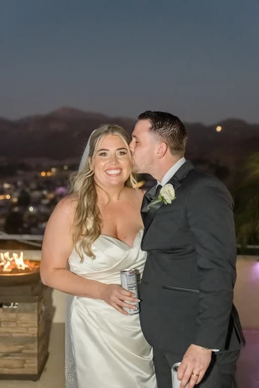 Joseph kissing Cecelia's cheek at dusk