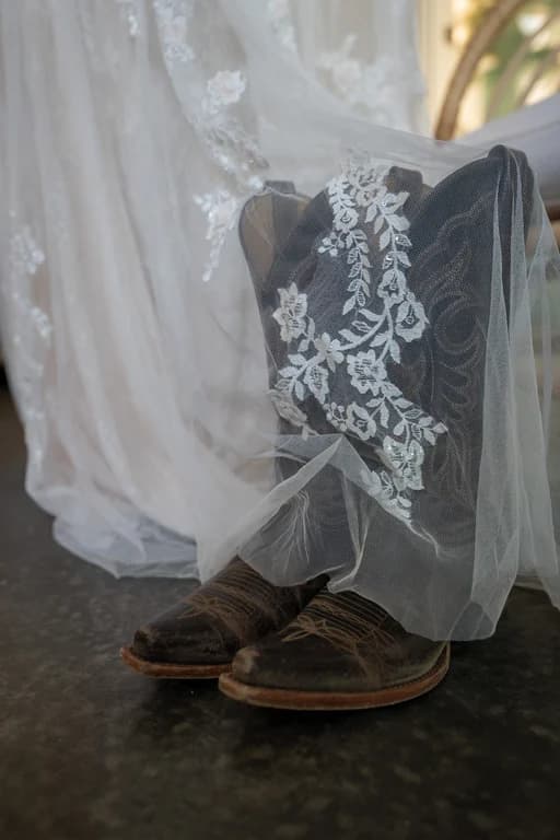 Cowboy boots beside the dress