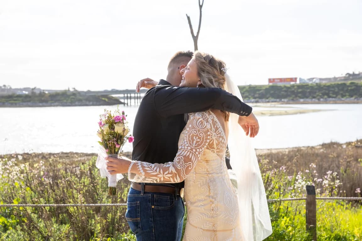 Corbin + Michaela embracing after the first look