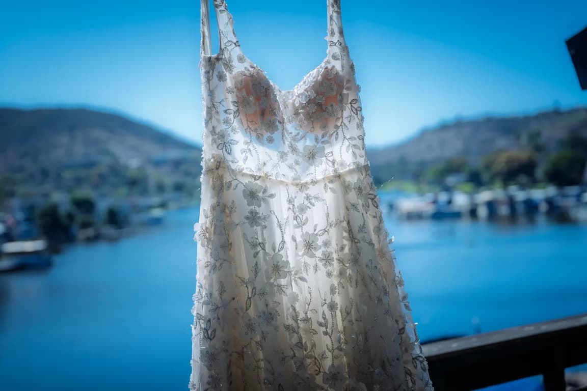 The wedding dress hanging over the lake