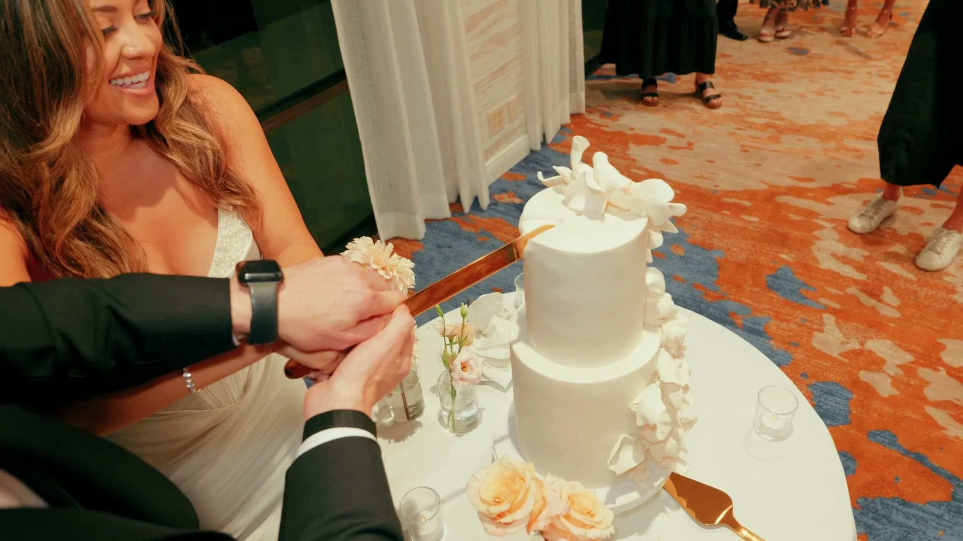 Nate + Angela cutting the cake