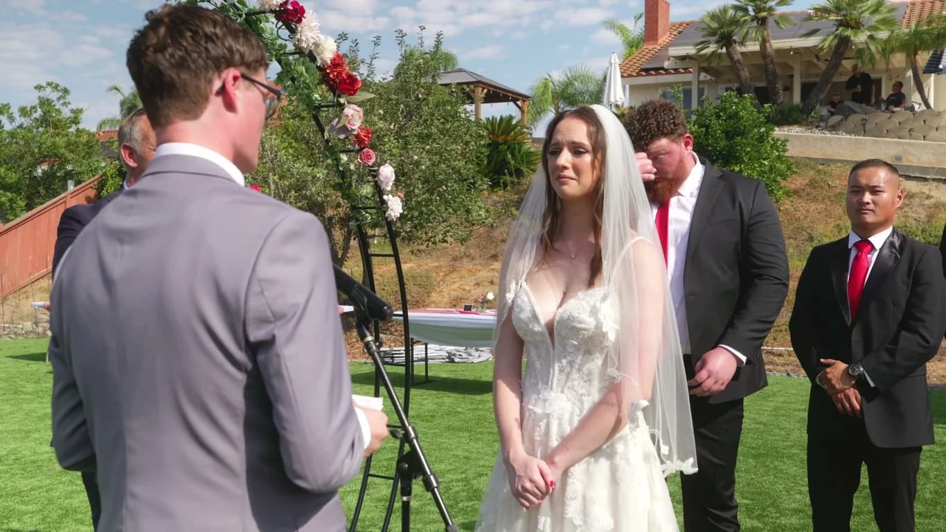 Lizzy listening to Jonathan's vows