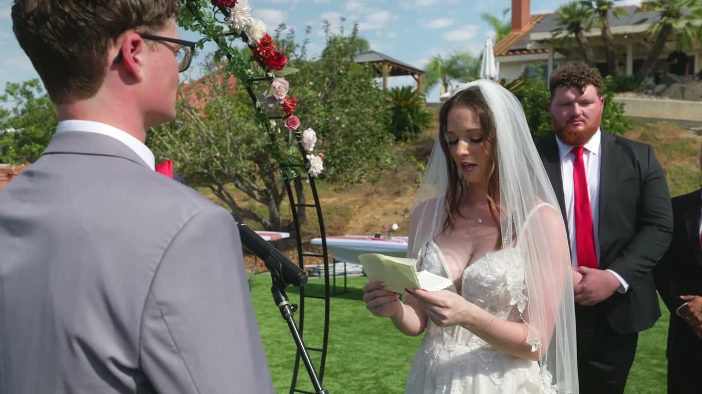Lizzy reading her vows to Jonathan