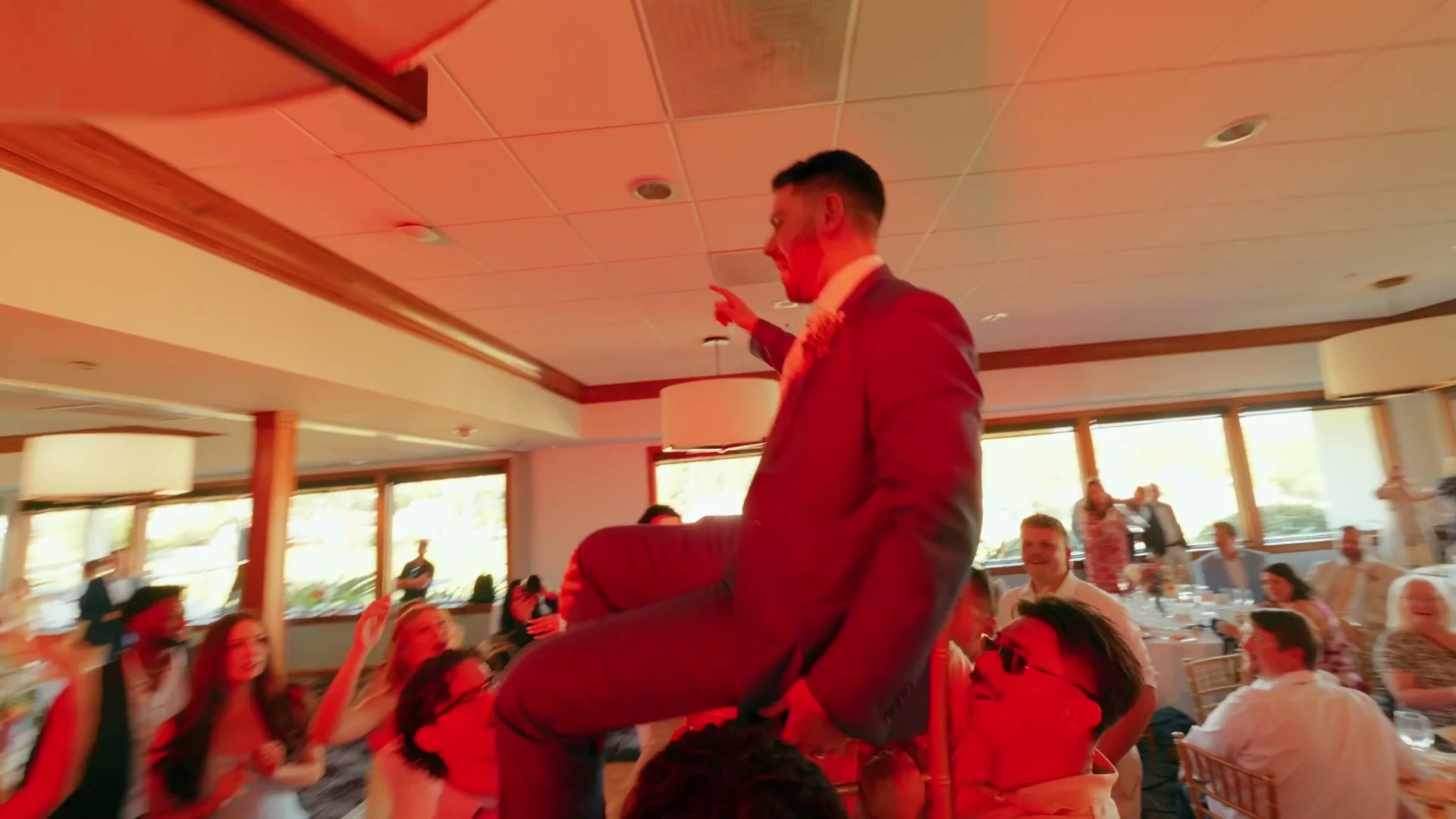 Up on a chair at the reception