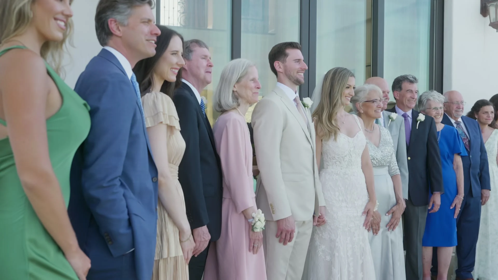 Family lined up for portraits with Patrick + Megan