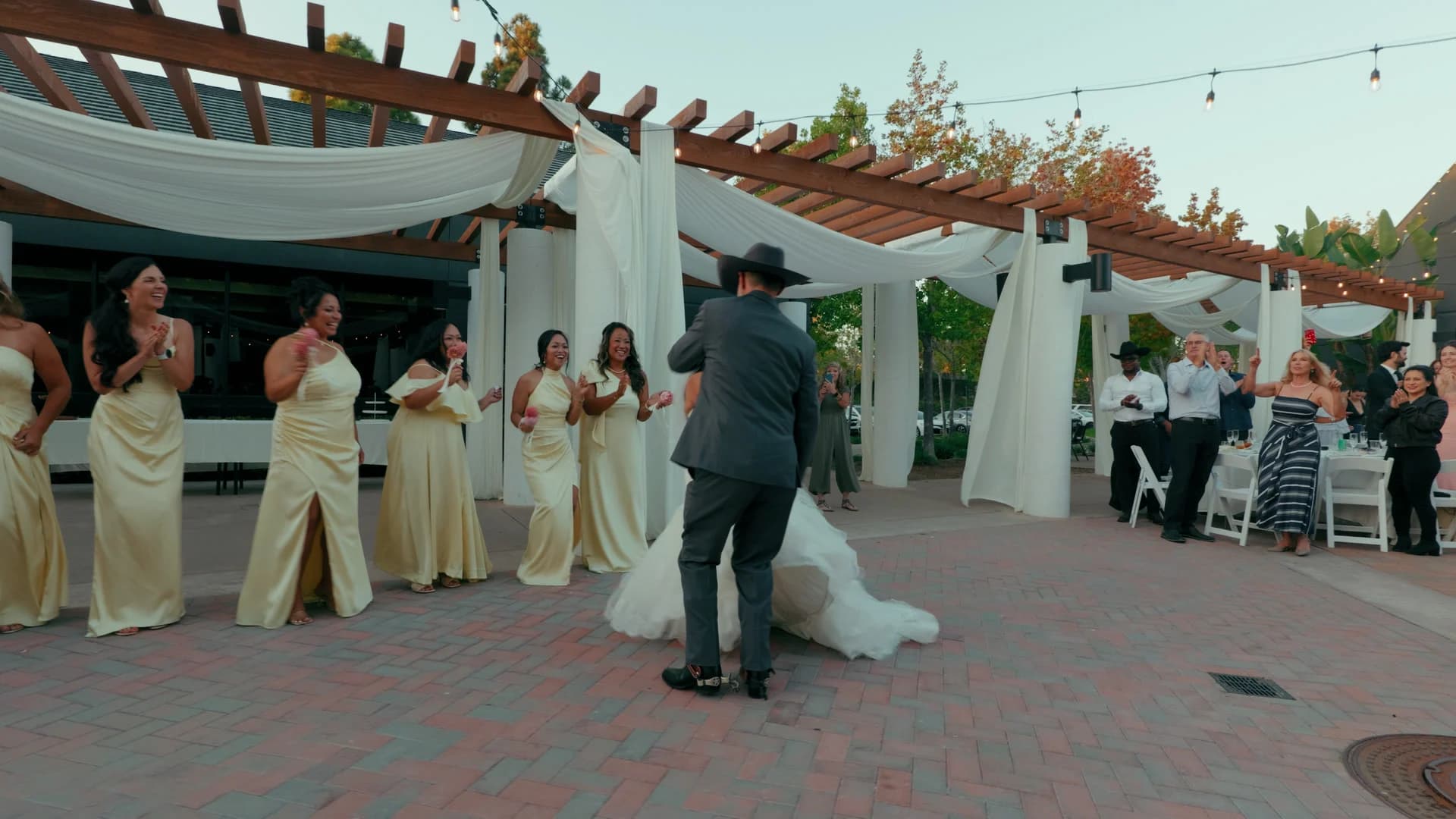 Kris + Pearl dancing into the reception