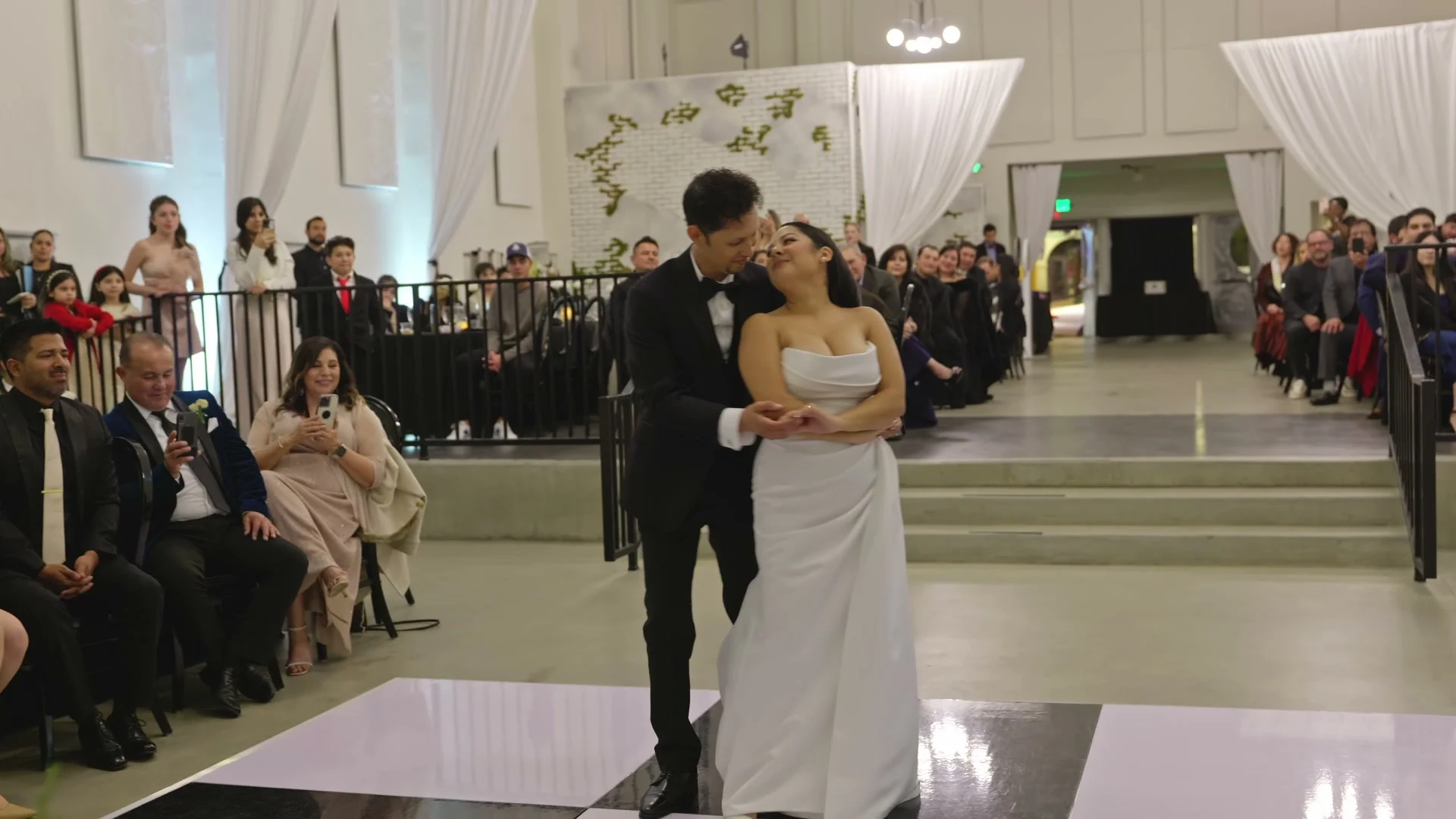 Sabrina + Caleb kissing as the ceremony ends