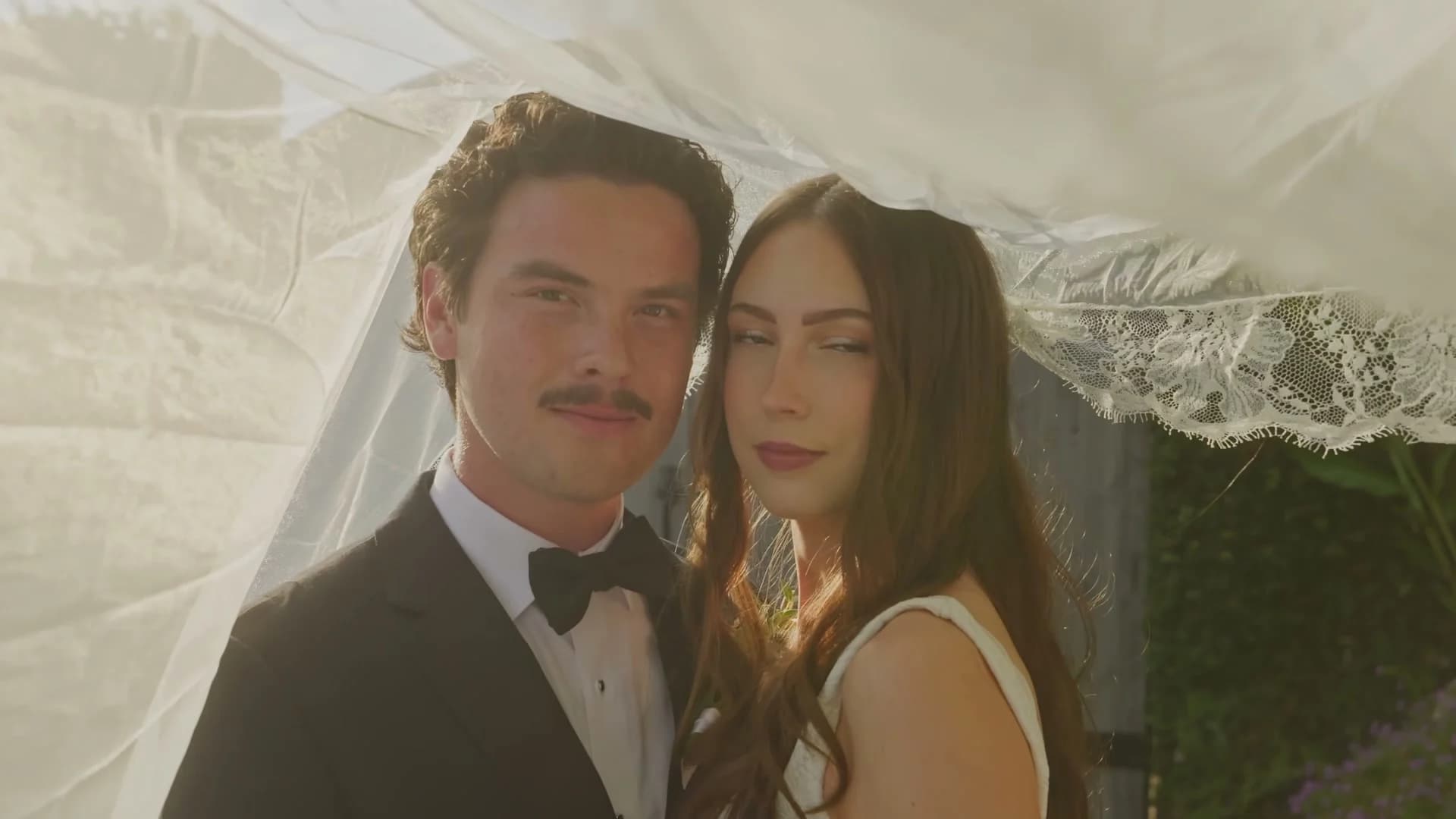 Zach + Madelin under her veil