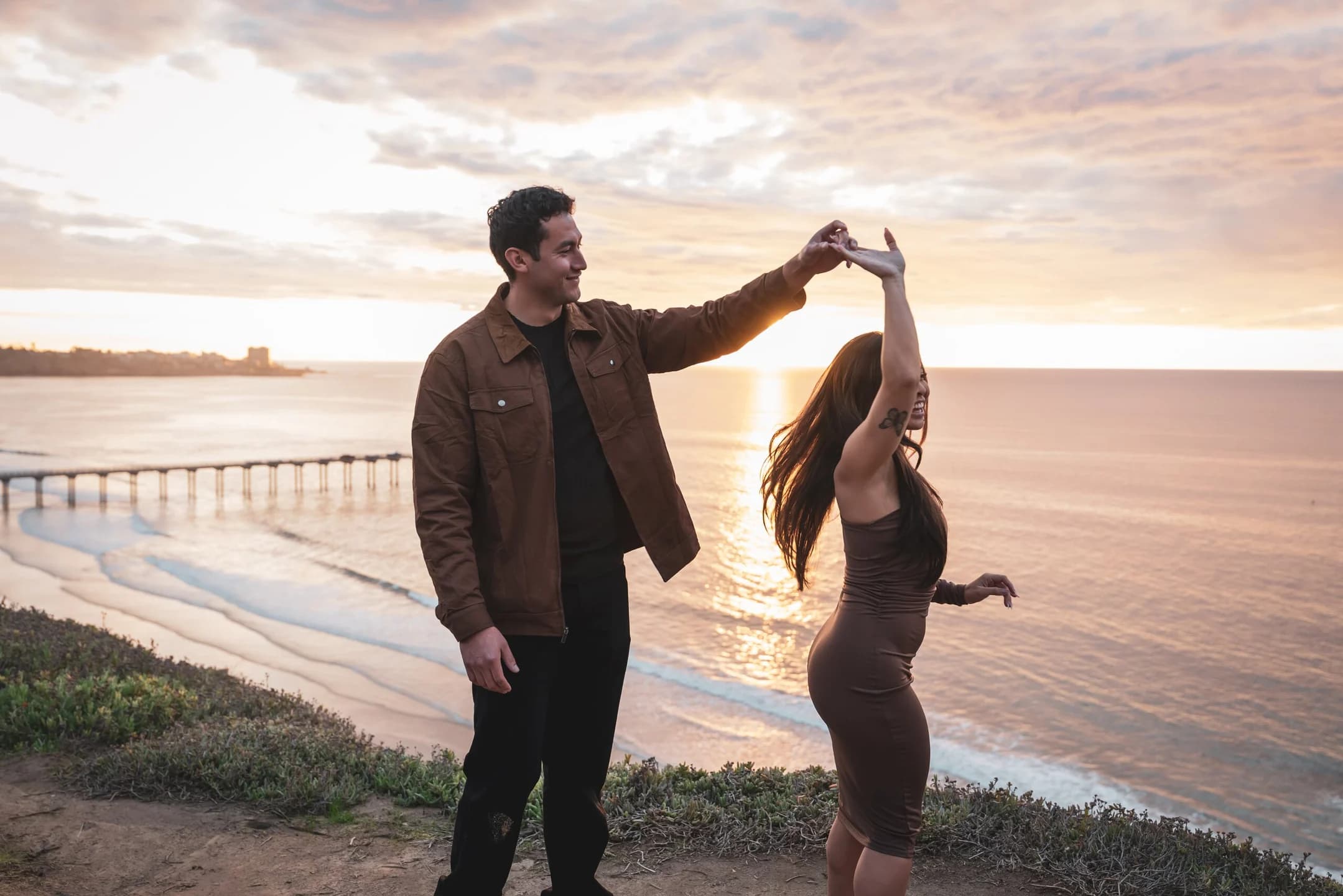 Mando + Melena's proposal on the coast at sunset — photographed by Paul Dal Studios