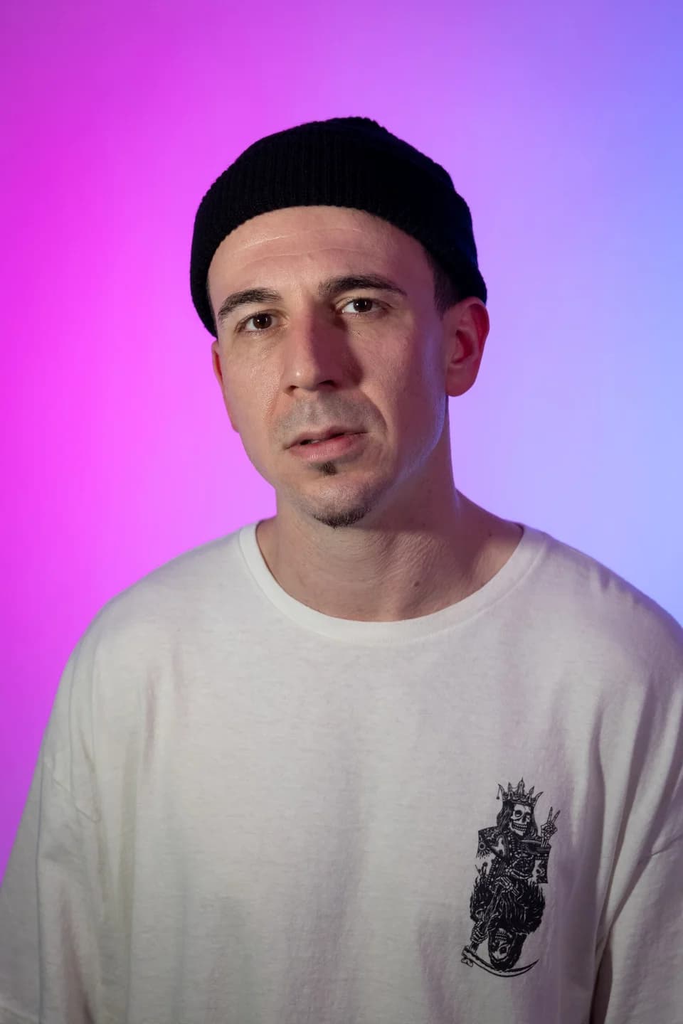 A studio portrait session with colored light — photographed by Paul Dal Studios