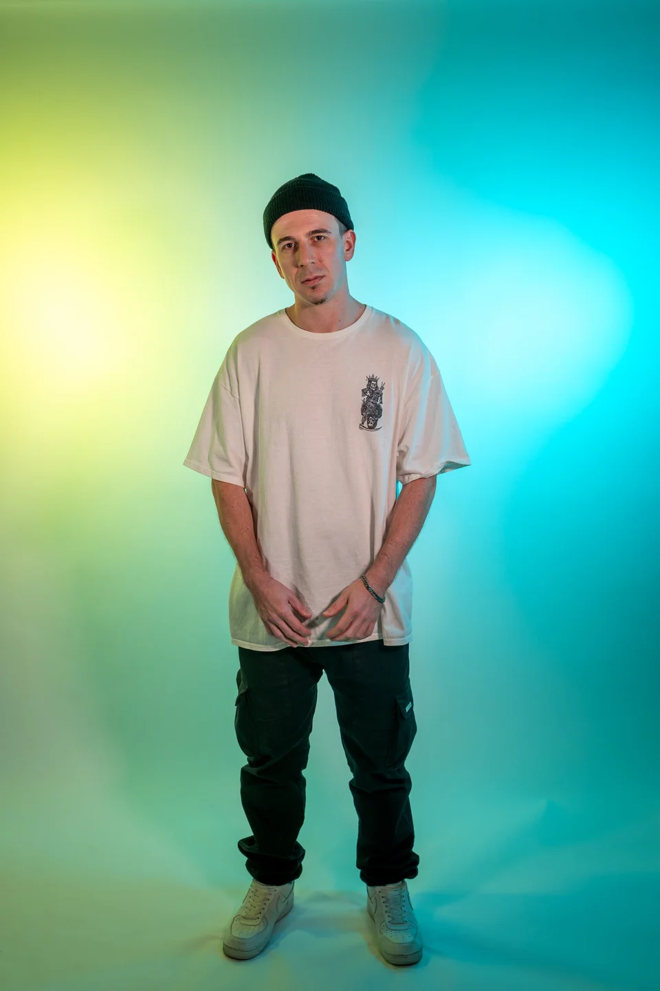 A studio portrait session with colored light — photographed by Paul Dal Studios